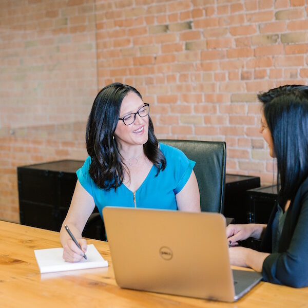 Accounting Basics Two women discussing accountancy services | Money Metrics Chartered Accountants NZ